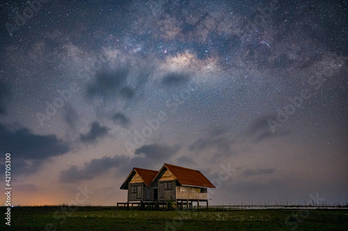 Milky Way with old house at Phatthalung Thailand  