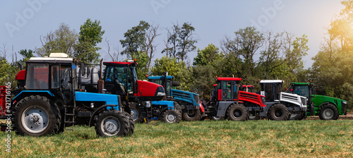 Agricultural machinery park on the field. 