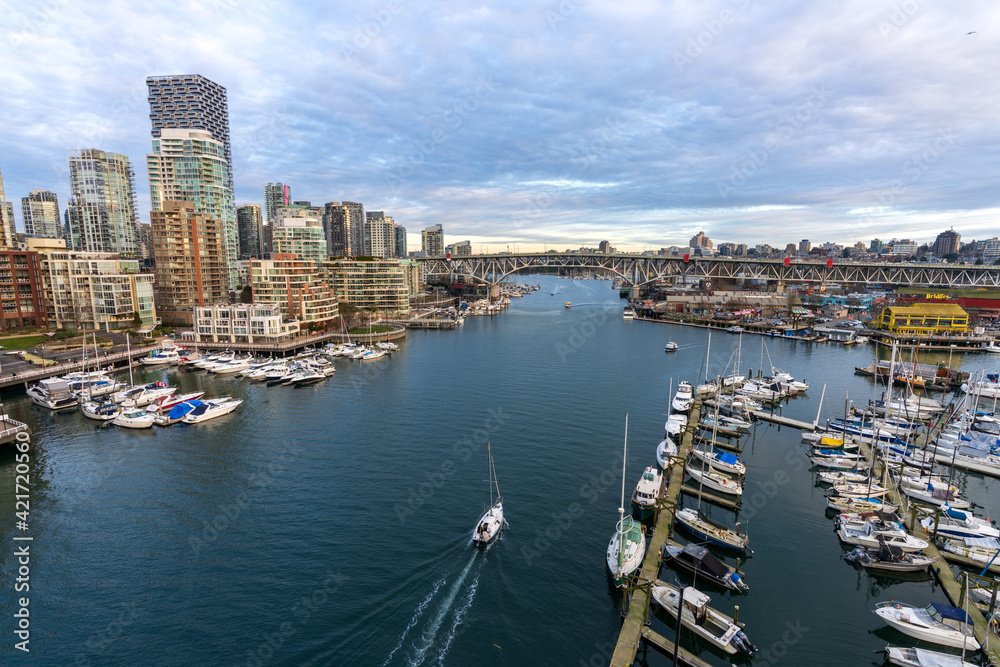 Beautiful view of Vancouver downtown skyline at sunset time, False Creek Harbour, British Columbia. Canada.