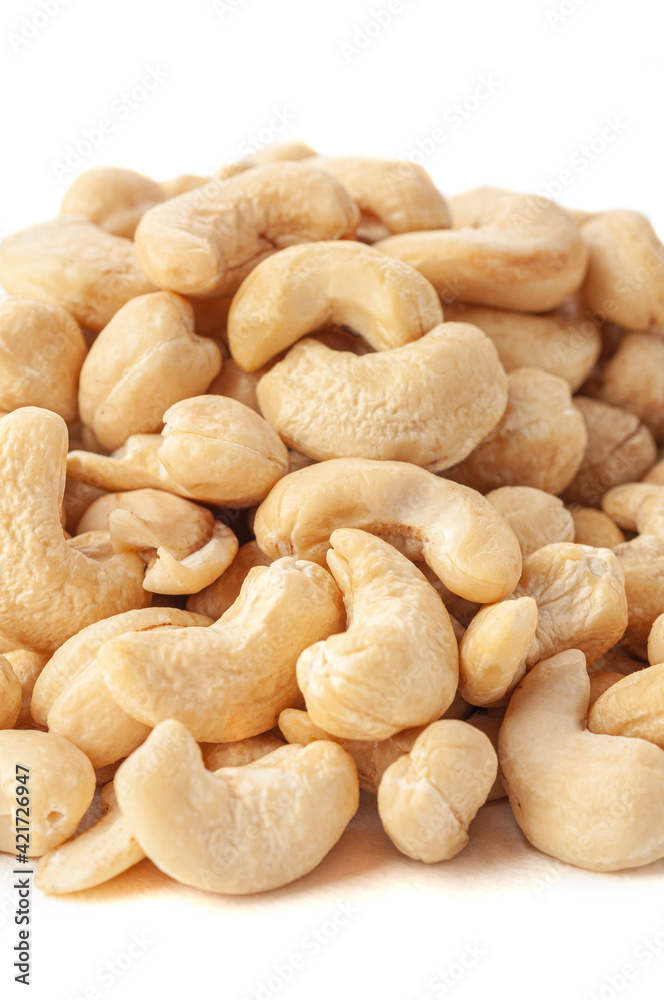 Cashew group. Close-up. White background . Isolated. Cashew group. Close-up. White background . Isolated.