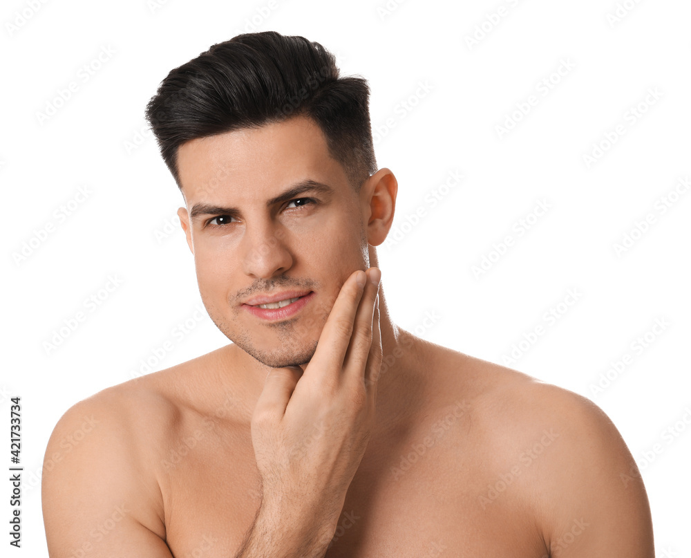 Handsome man with stubble before shaving on white background Handsome man with stubble before shaving on white background