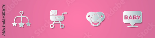 Set paper cut Baby crib hanging toys, stroller, dummy pacifier and icon. Paper art style. Vector