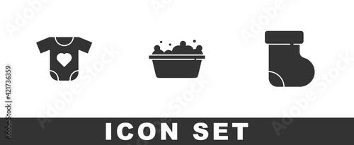 Set Baby clothes, bathtub and socks icon. Vector