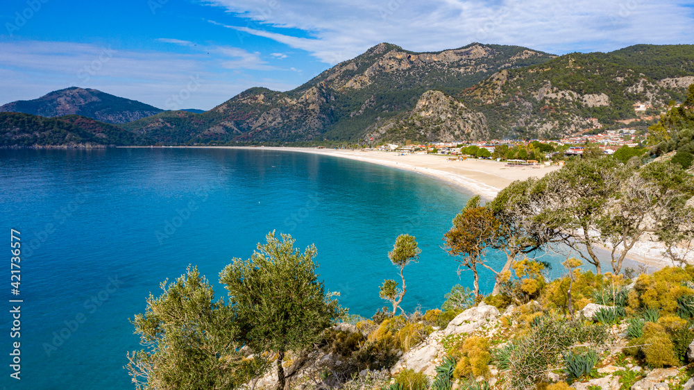 A fascinating view that has the unique nature of Oludeniz which is a county of Fethiye in Turkey. Because of its warm climate and fresh air, it has been an important destination to visit for tourists. A fascinating view that has the unique nature of Oludeniz which is a county of Fethiye in Turkey. Because of its warm climate and fresh air, it has been an important destination to visit for tourists.
