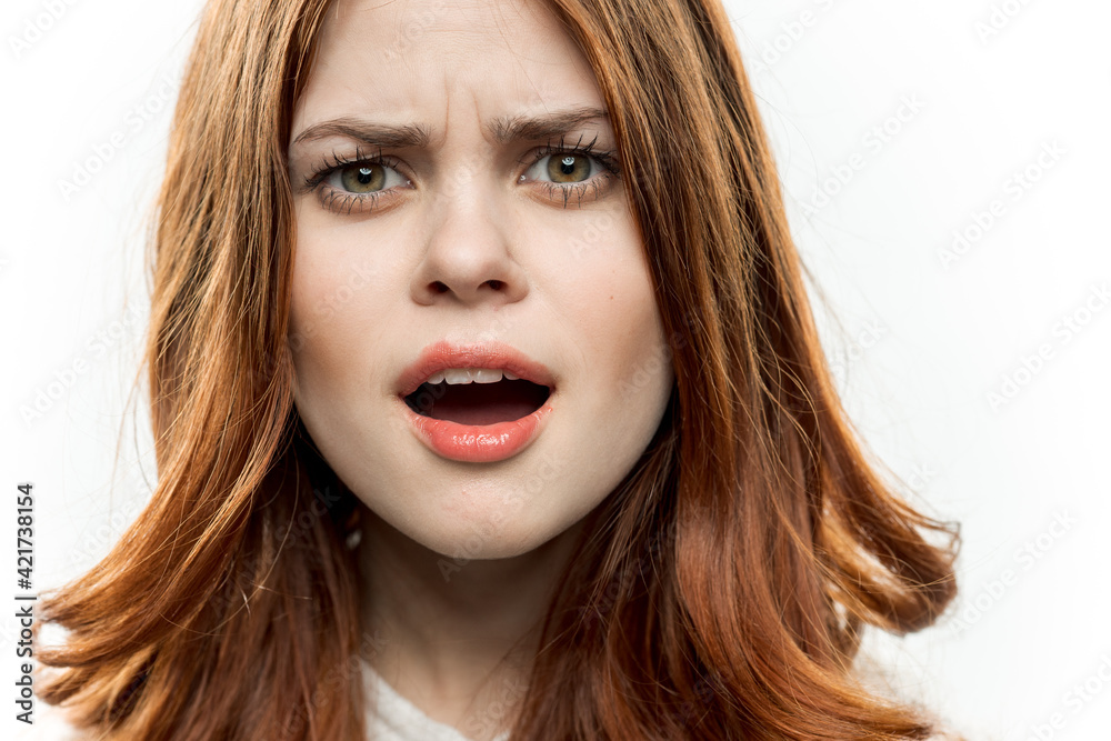 pretty surprised woman red hair face closeup emotions pretty surprised woman red hair face closeup emotions