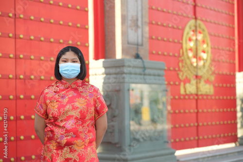 Asian women wear Chinese clothes during important Chinese festivals.