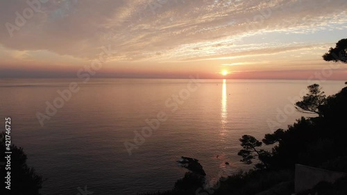 Aerial shot by drone of the sunset by the sea on the French Riviera. sanary, var, France