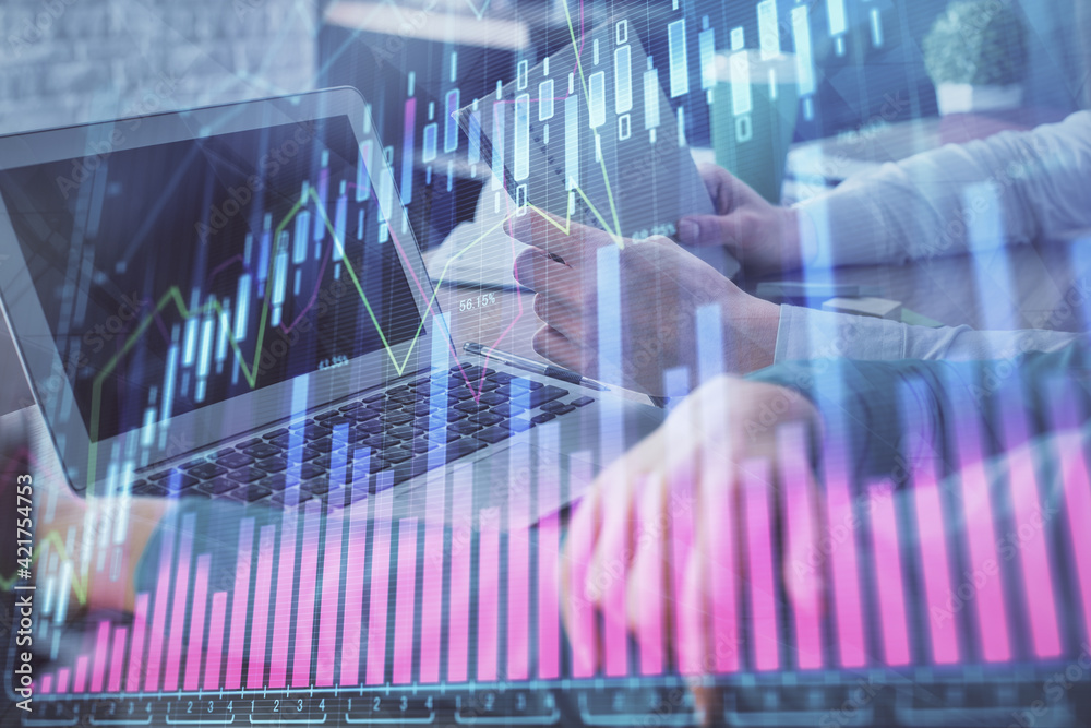 Double exposure of man and woman working together and forex chart hologram. Business concept. Computer background. Double exposure of man and woman working together and forex chart hologram. Business concept. Computer background.