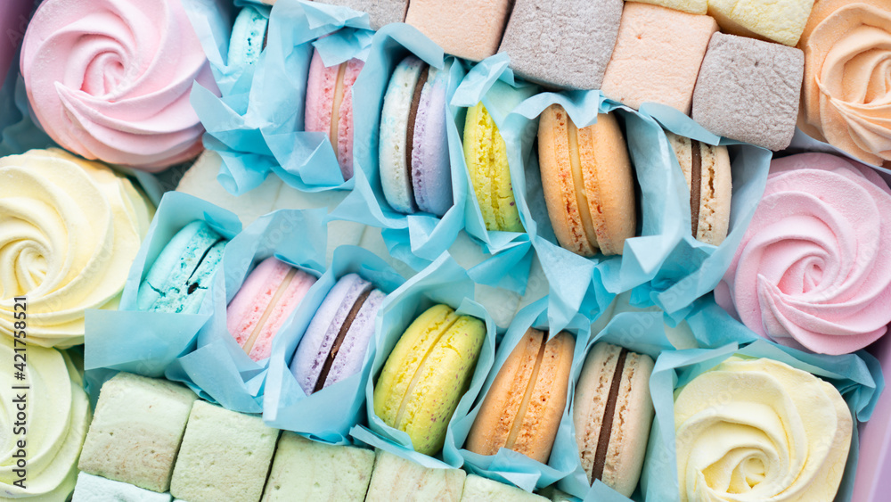 Soft confectionery gift box. Present box with macaroons. Gift box of multi-colored zephyrs Soft confectionery gift box. Present box with macaroons. Gift box of multi-colored zephyrs