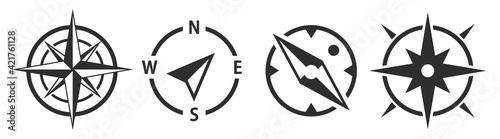 Compass icons set. Compass simple symbol with arrow. Wind rose icon isolated. Map symbol. Vector illustration.