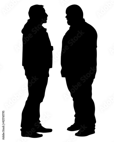 Two men walking on street. Isolated silhouette on a white background