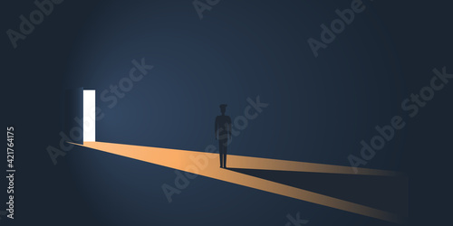 Standing Figure in a Dark Room in Front of an Open Door with Bright Light Coming In From Outside - New Possibilities, Hope, Overcome Problems, Solution Finding Concept Design