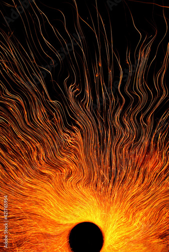 Abstract circle flame sparks or Black hole concept. Vertical background or wallpaper with copy space. Event horizon