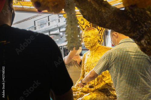 Bangkok, Thailand - June 7, 2020 : Thai people, Buddhism, respect and worship the Buddha for the prosperity at Wat Paknam Bhasicharoen, Bangkok, Thailand.