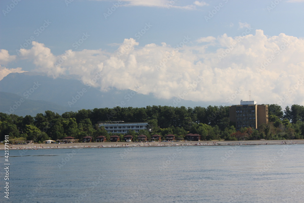 Fototapeta premium Beach and hotels in pine grove