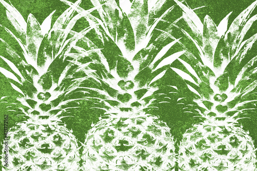 Multi layered composite image of pineapple fruits on a green grunge vintage background. Ideal for print canvas home decoration.