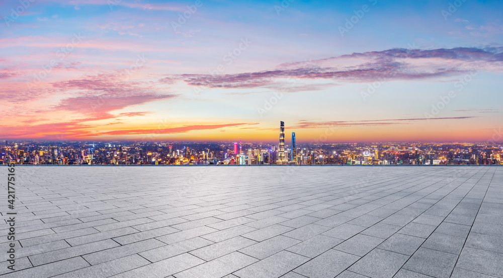 Empty square floor and Shanghai skyline with buildings at sunset,China.High angle view.