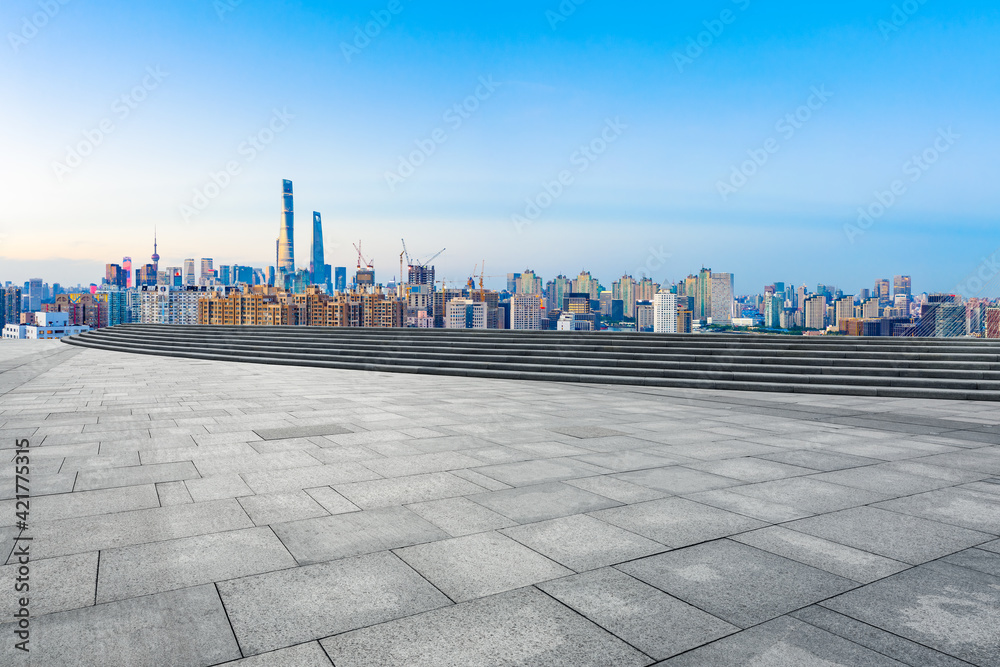 Empty square floor and Shanghai skyline with buildings at dusk,China.High angle view.