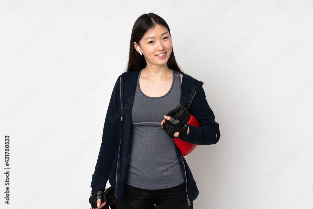 Young sport asian woman isolated on white background with boxing gloves Young sport asian woman isolated on white background with boxing gloves