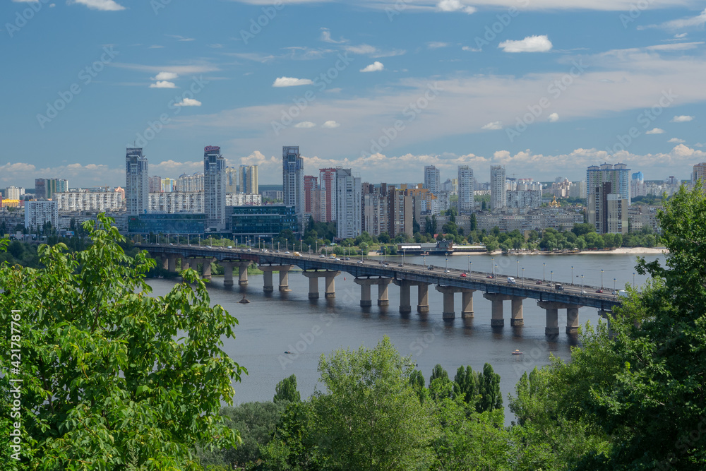 Residential district on the left coast of Dnieper and Paton bridge in Kyiv, Ukraine