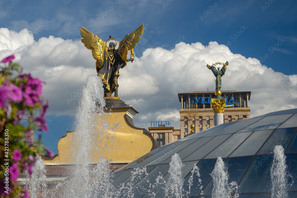 View of the Hotel Ukraine through the fountain in Kiev, Ukraine