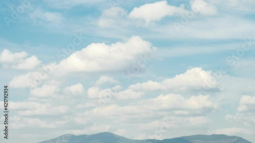time lapse of cloudy blue sky