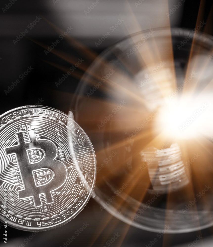 Bitcoin and the bubble as an abstract symbol of the risks of a digital currency and possible collapse and abrupt change of course (falling, collapse, fiasco, fraud - the concept)