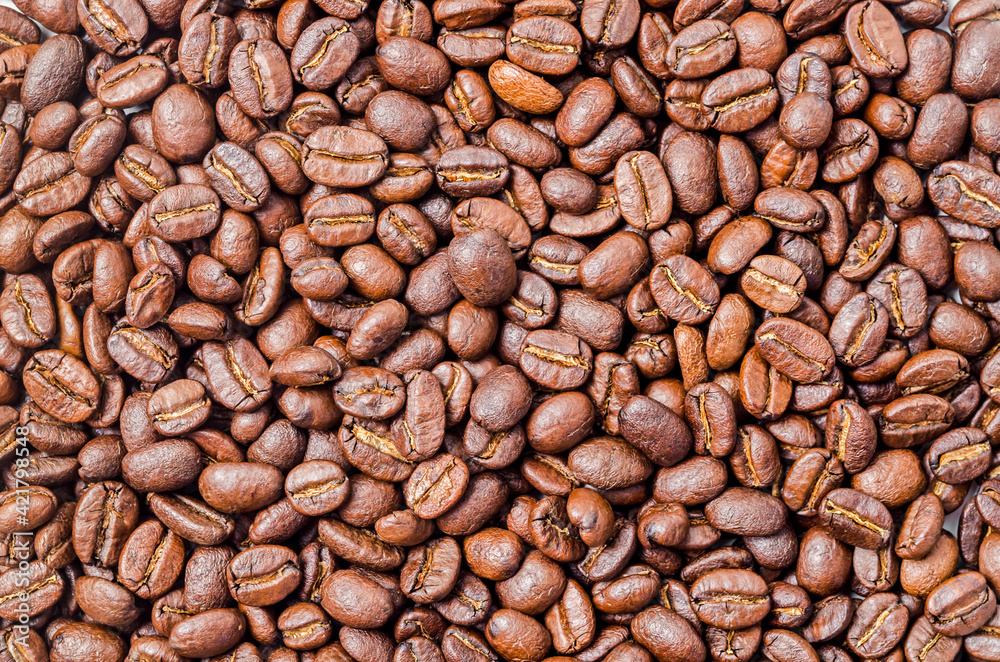 Roasted coffee beans. Roasted coffee beans.