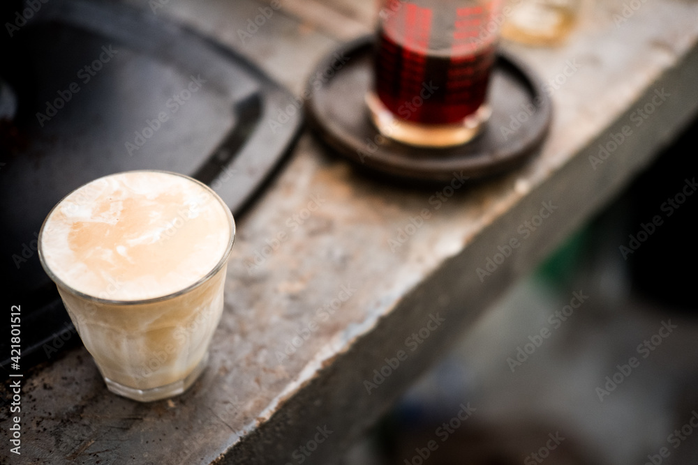 Dirty coffee menu in a clear glass Dirty coffee menu in a clear glass