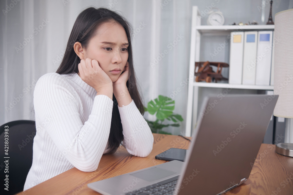 Stressful anxious young Asian woman enthusiastic watching video call conference online internet movie entertainment home living relaxing lifestyle, student online class learning education quarantine Stressful anxious young Asian woman enthusiastic watching video call conference online internet movie entertainment home living relaxing lifestyle, student online class learning education quarantine