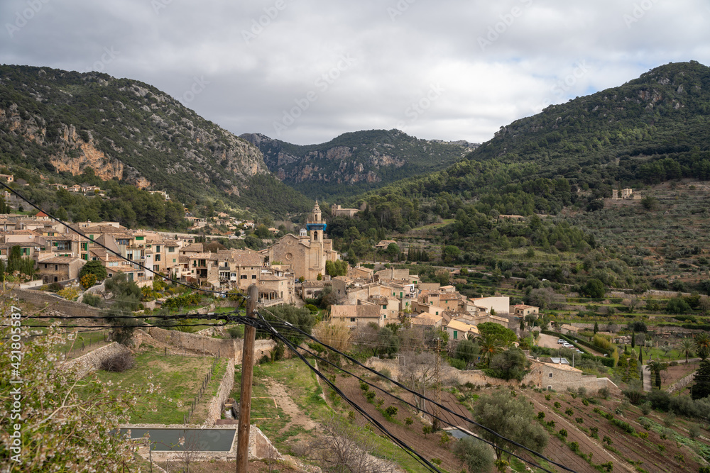 Beautiful sunny landscape of the village of Valldemossa in the Tramuntana mountain range. Palma de Mallorca, Spain