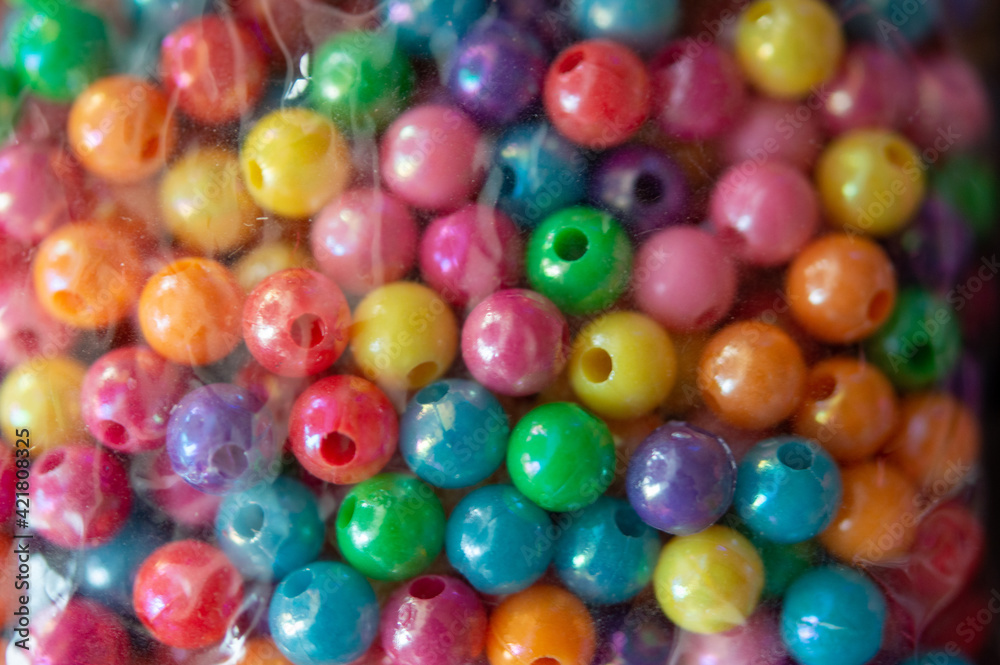 colorful plastic round beads in a box colorful plastic round beads in a box