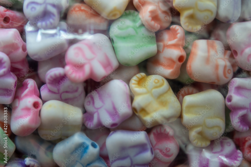 colorful plastic beads in a box colorful plastic beads in a box