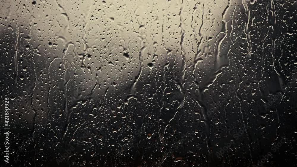 rain days, heavy rain falling on window surface