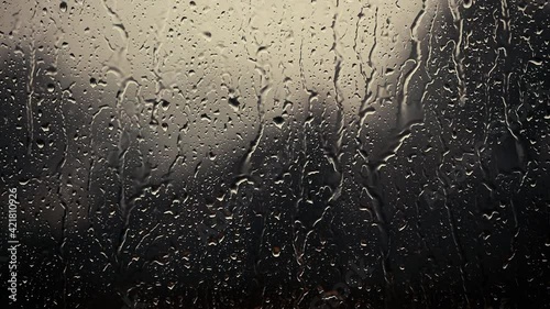 rain days, heavy rain falling on window surface photo
