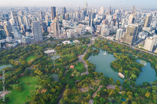 Aerial view of green trees in Lumpini Park downtown Financial district center in Sathorn district sBangkok