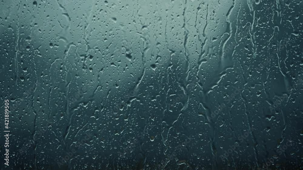 rain days, heavy rain falling on window surface
