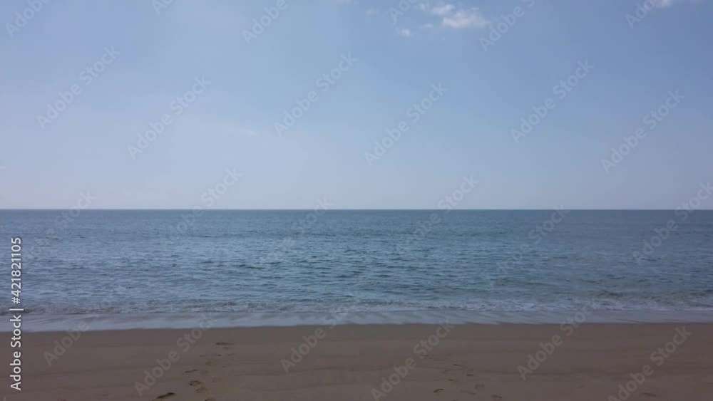 video 4k of the tropical beach with white sand beach and clear blue sky in UHD 4k video. Maikao beach at Phuket Thailand video 4k of the tropical beach with white sand beach and clear blue sky in UHD 4k video. Maikao beach at Phuket Thailand