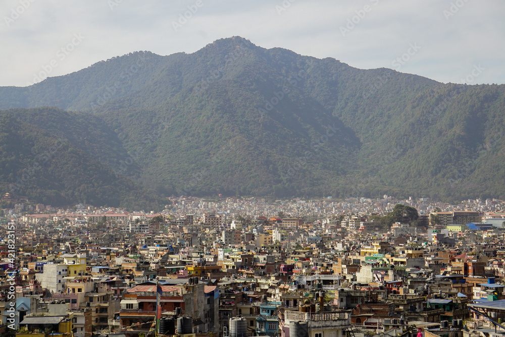 View of Kathmandu (Nepal) with a mountain in the background on a clear sunny day
