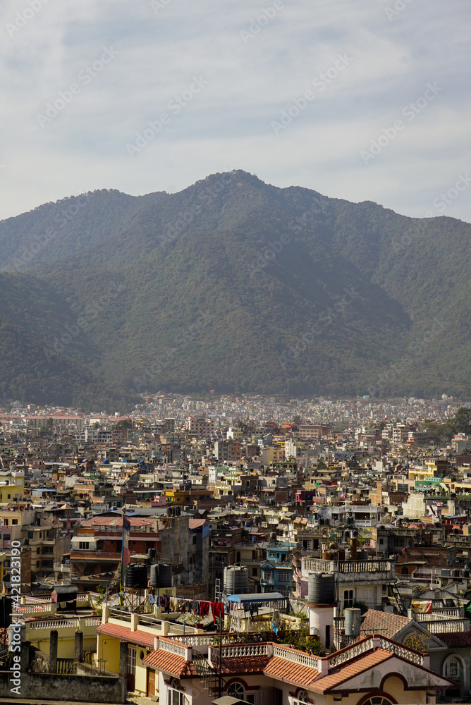 Kathmandu (Nepal) laying at the foot of a mountain