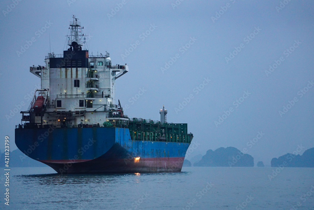 Huge oil tanker ship on a moody morning