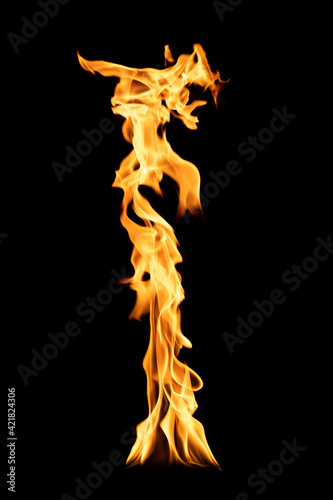 Isolated flame column. Flames of fire. Bright orange column of fire.