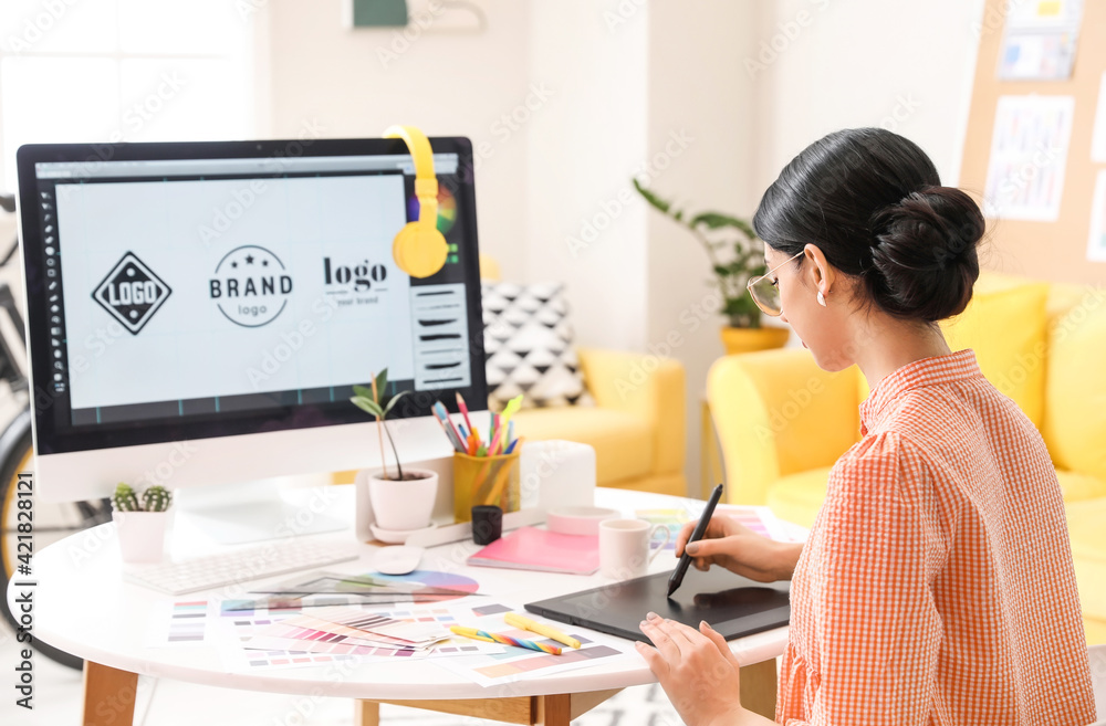 Graphic designer working in office Graphic designer working in office