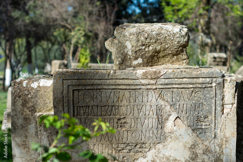 Text on a stone from Roman ruins  photo