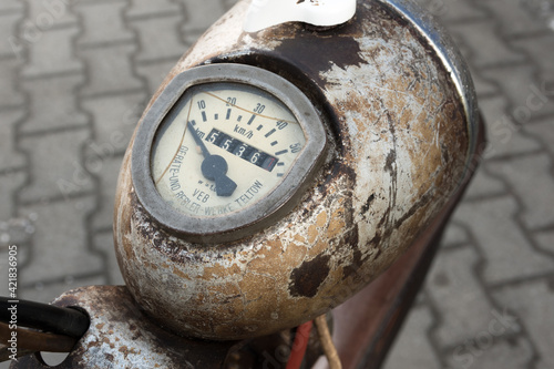 old rusty tachometer of a historical moped