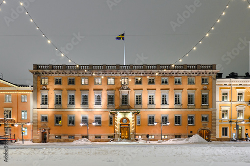 Obraz na płótnie Embassy of Sweden in winter night with Christmas decoration in Helsinki, Finland. The beautiful old classic European architecture. w salonie