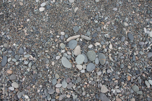 Small and smooth waterworn Grey and white pebble use for garden decoration