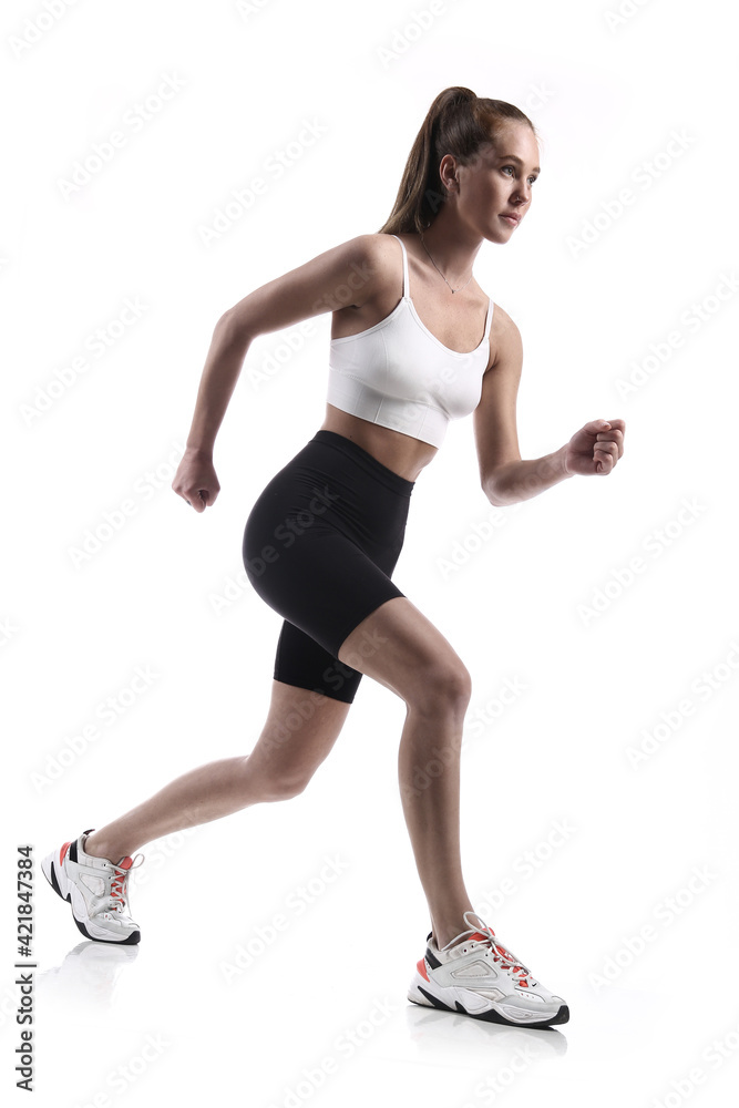 Running fitness woman. Isolated over white background.