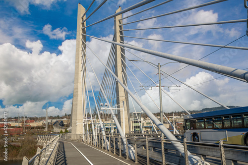 Looking down the pedestrian bicycle path on the cable stayed Tilikum bridge over the Willamette River in Portland Oregon
