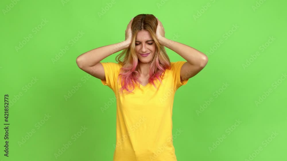 Young blonde woman unhappy and frustrated with something over isolated background on green screen chroma key Young blonde woman unhappy and frustrated with something over isolated background on green screen chroma key